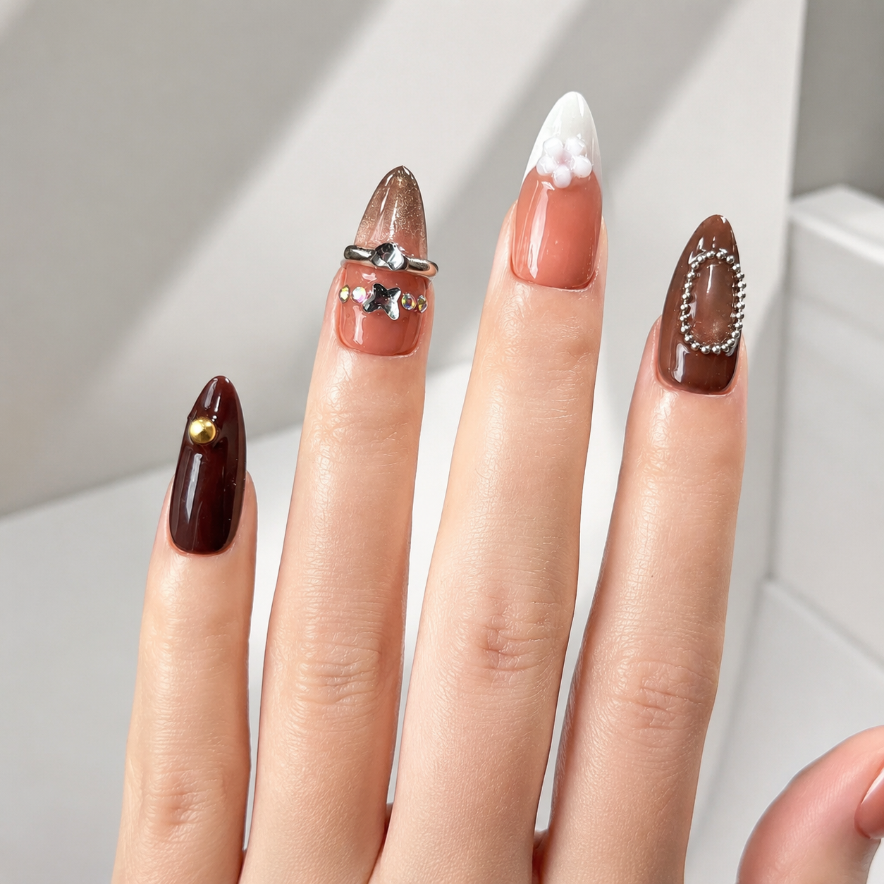 Elegant handmade mocha blossom medium almond nails with cat eye and 3D flower-Amber Atelier A007