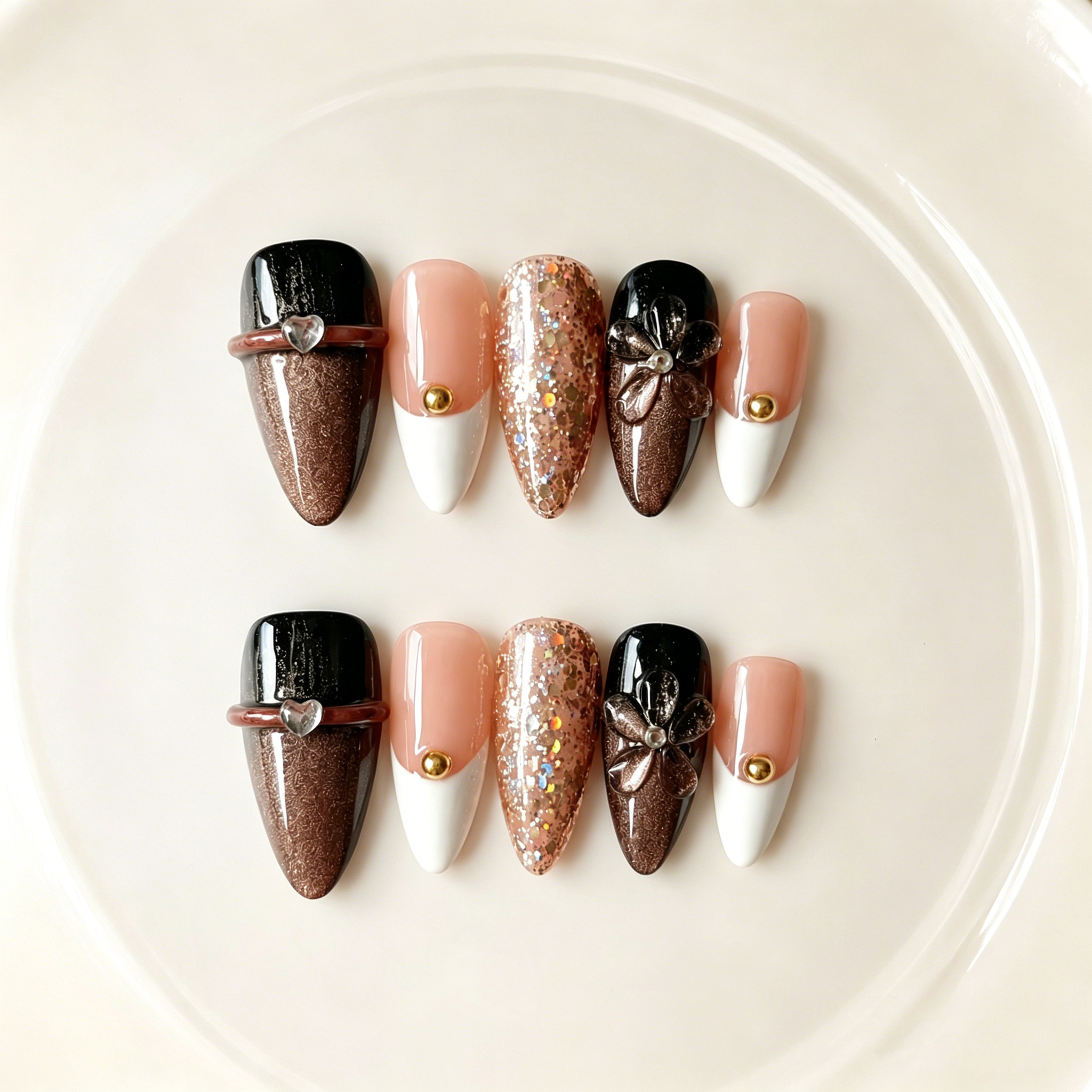 -Handmade espresso brown & black with 3D floral design, glitter gradient & gold accent medium almond nailsMocha Noir A015
