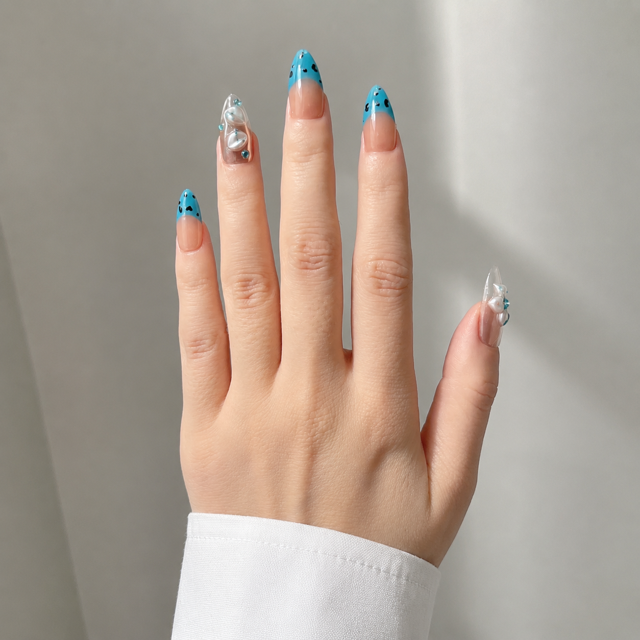 Handmade blue french tip press on nails medium almond 3D white flower rhinestone silver accent custom nail art-Ocean Dots A063