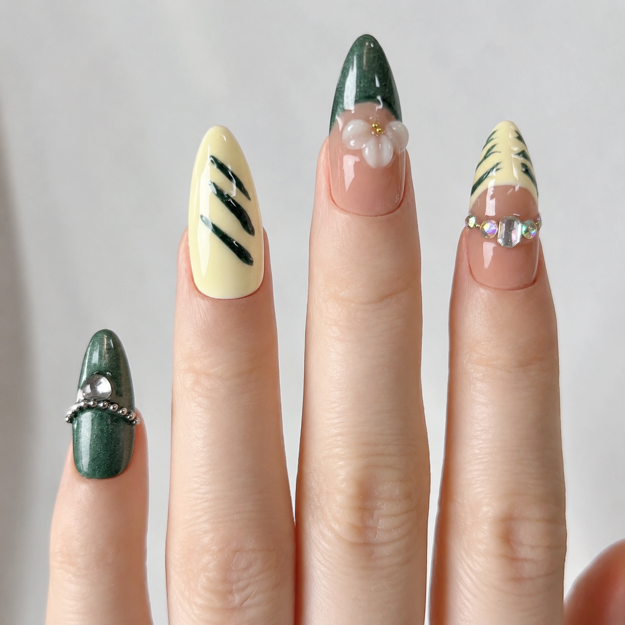 Handmade nails medium almond nude base with deep emerald green cat eye french tip 3D floral design chain detail-Forest Bloom A072